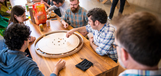 Rustici staff members playing board games