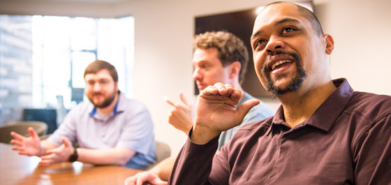 Rustici staff in a meeting