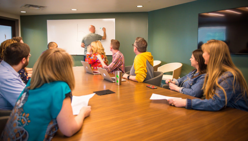 Rustici staff in a meeting