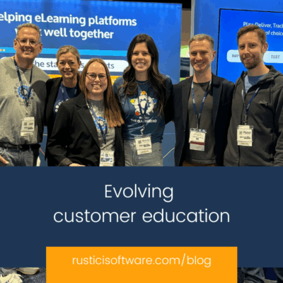 Customer education blog cover image with Rustici employees at a conference